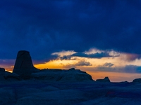 The Yadan landform landscape of the Devil City scenic area in the desert Gobi is being seen at sunset after strong winds in Karamay, China,...