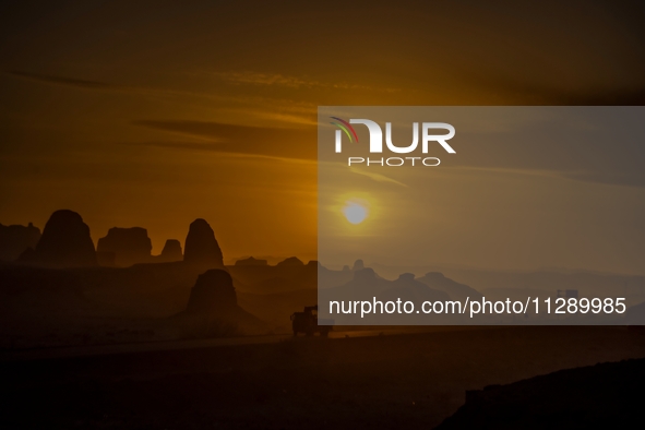 The Yadan landform landscape of the Devil City scenic area in the desert Gobi is being seen at sunset after strong winds in Karamay, China,...