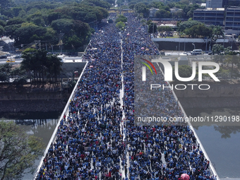 Faithful are participating in the 32nd March for Jesus promoted by the Renascer em Cristo Church in the Central region of Sao Paulo, on Thur...