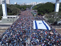 Faithful are participating in the 32nd March for Jesus promoted by the Renascer em Cristo Church in the Central region of Sao Paulo, on Thur...