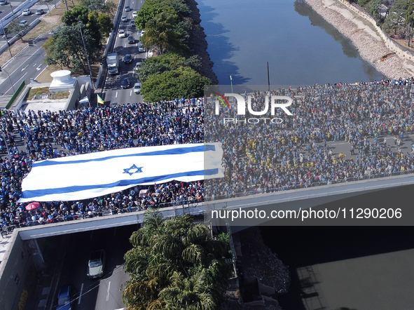 Faithful are participating in the 32nd March for Jesus promoted by the Renascer em Cristo Church in the Central region of Sao Paulo, on Thur...