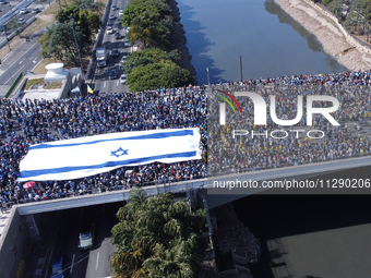 Faithful are participating in the 32nd March for Jesus promoted by the Renascer em Cristo Church in the Central region of Sao Paulo, on Thur...