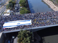 Faithful are participating in the 32nd March for Jesus promoted by the Renascer em Cristo Church in the Central region of Sao Paulo, on Thur...