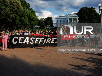 People attend a 'Mourner's Kaddish for Rafah' demonstration in front of the White House in Washington, D.C. on May 30, 2024. The action was...