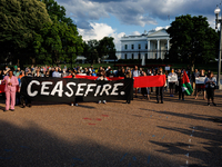 People attend a 'Mourner's Kaddish for Rafah' demonstration in front of the White House in Washington, D.C. on May 30, 2024. The action was...