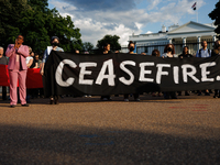 People attend a 'Mourner's Kaddish for Rafah' demonstration in front of the White House in Washington, D.C. on May 30, 2024. The action was...