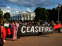 People attend a 'Mourner's Kaddish for Rafah' demonstration in front of the White House in Washington, D.C. on May 30, 2024. The action was...