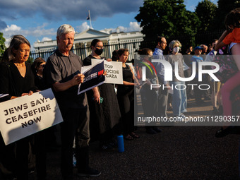 People attend a 'Mourner's Kaddish for Rafah' demonstration in front of the White House in Washington, D.C. on May 30, 2024. The action was...