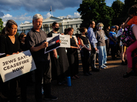 People attend a 'Mourner's Kaddish for Rafah' demonstration in front of the White House in Washington, D.C. on May 30, 2024. The action was...