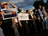 People attend a 'Mourner's Kaddish for Rafah' demonstration in front of the White House in Washington, D.C. on May 30, 2024. The action was...