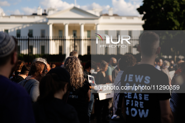 People attend a 'Mourner's Kaddish for Rafah' demonstration in front of the White House in Washington, D.C. on May 30, 2024. The action was...