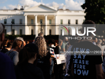 People attend a 'Mourner's Kaddish for Rafah' demonstration in front of the White House in Washington, D.C. on May 30, 2024. The action was...