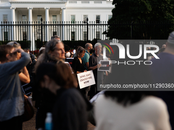 People attend a 'Mourner's Kaddish for Rafah' demonstration in front of the White House in Washington, D.C. on May 30, 2024. The action was...