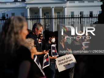 People attend a 'Mourner's Kaddish for Rafah' demonstration in front of the White House in Washington, D.C. on May 30, 2024. The action was...