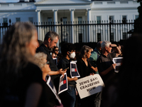 People attend a 'Mourner's Kaddish for Rafah' demonstration in front of the White House in Washington, D.C. on May 30, 2024. The action was...