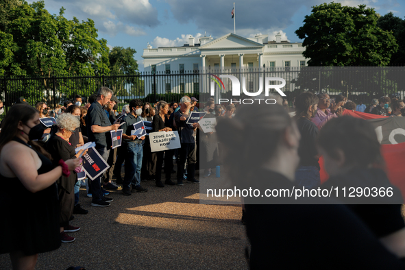 People attend a 'Mourner's Kaddish for Rafah' demonstration in front of the White House in Washington, D.C. on May 30, 2024. The action was...