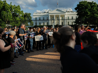 People attend a 'Mourner's Kaddish for Rafah' demonstration in front of the White House in Washington, D.C. on May 30, 2024. The action was...