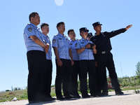 Border police officers are flying independently under the guidance of instructors in Altay, Xinjiang province, China, on May 31, 2024. (