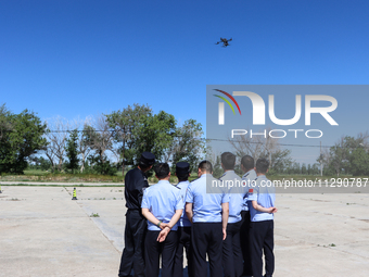 Border police officers are flying independently under the guidance of instructors in Altay, Xinjiang province, China, on May 31, 2024. (