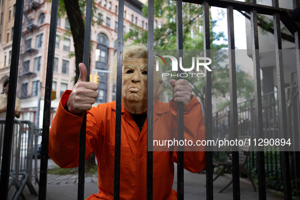 People are gathering across the street from Manhattan Criminal Court in New York, United States, on May 30, 2024, moments after a jury finds...