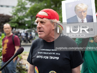 Supporters of former U.S. president Donald Trump are gathering near Manhattan Criminal Court in New York, United States, on May 30, 2024, mo...