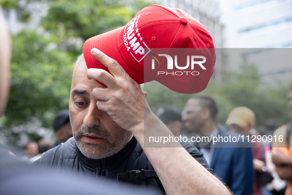 Supporters of former U.S. president Donald Trump are gathering near Manhattan Criminal Court in New York, United States, on May 30, 2024, mo...