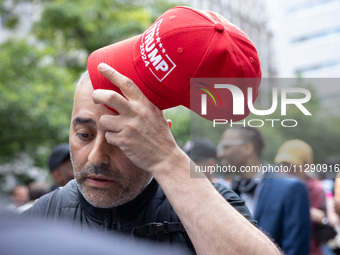 Supporters of former U.S. president Donald Trump are gathering near Manhattan Criminal Court in New York, United States, on May 30, 2024, mo...