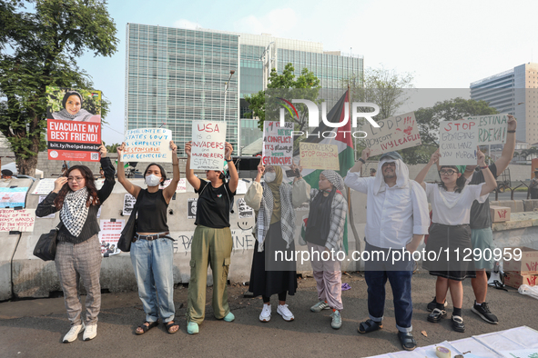 Indonesian Pro-Palestine Muslims are holding a rally in front of the US Embassy in Jakarta, Indonesia, on May 31, 2024.  