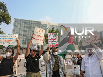 Indonesian Pro-Palestine Muslims are holding a rally in front of the US Embassy in Jakarta, Indonesia, on May 31, 2024.  (