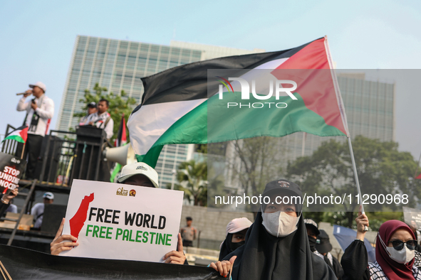 Indonesian Pro-Palestine Muslims are holding a rally in front of the US Embassy in Jakarta, Indonesia, on May 31, 2024.  