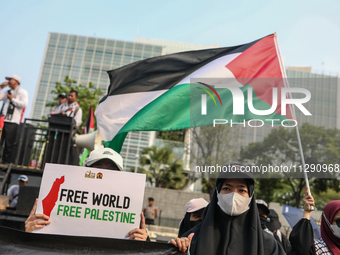 Indonesian Pro-Palestine Muslims are holding a rally in front of the US Embassy in Jakarta, Indonesia, on May 31, 2024.  (