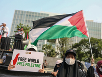 Indonesian Pro-Palestine Muslims are holding a rally in front of the US Embassy in Jakarta, Indonesia, on May 31, 2024.  (