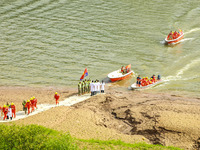 An emergency team is participating in an emergency rescue drill during the 2024 flood control and geological disaster comprehensive emergenc...