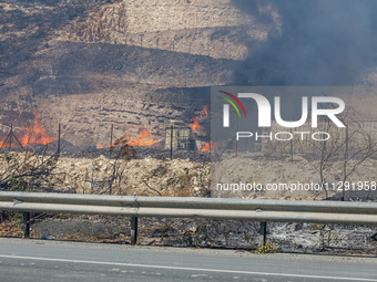 Flames are being seen inside a private property area in Limassol, Cyprus, on May 31, 2024. Some buildings are being endangered after a fire...