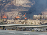 Flames are being seen inside a private property area in Limassol, Cyprus, on May 31, 2024. Some buildings are being endangered after a fire...