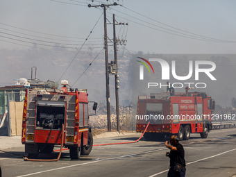 Firemen are being seen in the area in Limassol, Cyprus, on May 31, 2024. Some buildings are being in danger after a fire is breaking out in...