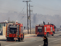 Firemen are being seen in the area in Limassol, Cyprus, on May 31, 2024. Some buildings are being in danger after a fire is breaking out in...