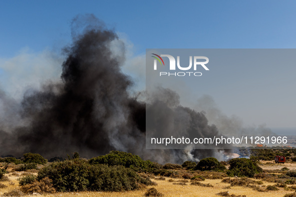 Thick smoke is being seen in the area in Limassol, Cyprus, on May 31, 2024. Some buildings are being in danger after a fire is breaking out...