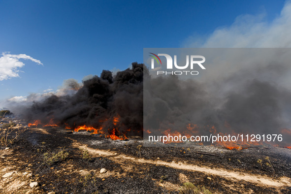 Thick smoke is being seen in the area in Limassol, Cyprus, on May 31, 2024. Some buildings are being in danger after a fire is breaking out...