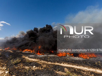 Thick smoke is being seen in the area in Limassol, Cyprus, on May 31, 2024. Some buildings are being in danger after a fire is breaking out...