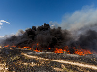 Thick smoke is being seen in the area in Limassol, Cyprus, on May 31, 2024. Some buildings are being in danger after a fire is breaking out...