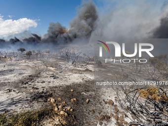 Thick smoke is being seen in the area in Limassol, Cyprus, on May 31, 2024. Some buildings are being in danger after a fire is breaking out...