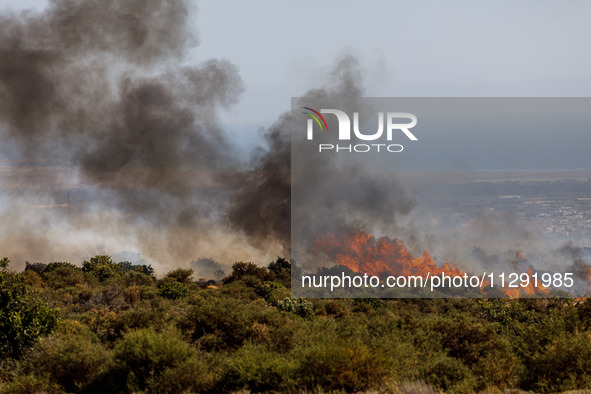 Flames are being seen in the area, Limassol, Cyprus, on May 31, 2024. Some buildings are being in danger after a fire is breaking out in the...