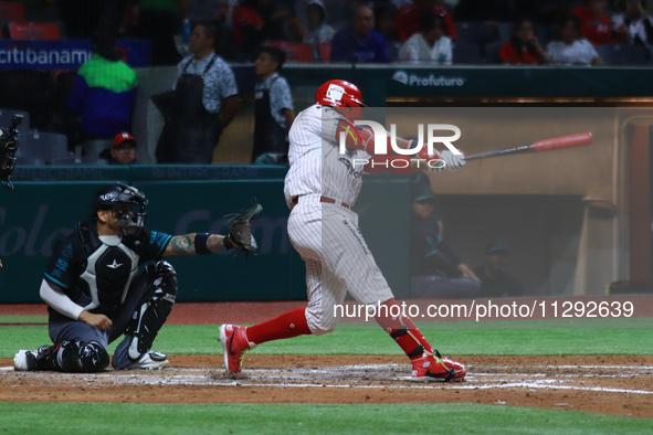 Robinson Cano #22 of Diablos Rojos is hitting the ball during the Saraperos de Saltillo vs. Diablos Rojos del Mexico match 2 of the Mexican...