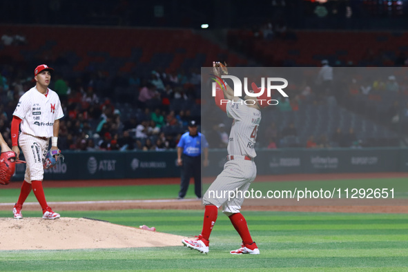 Jose Marmolejos #43 of Diablos Rojos is catching an infield fly during the Saraperos de Saltillo vs. Diablos Rojos del Mexico match 2 of the...