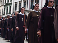 Nuns attend in Corpus Christi procession in Krakow, Poland on May 30, 2024. The procession starts with a priest carrying a monstrance under...