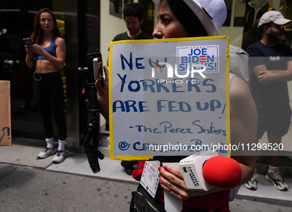 Anti-Trump protesters are standing outside as former president Donald Trump is making a statement after a guilty verdict at Trump Tower in N...