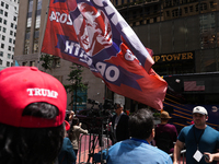 Trump supporters are standing outside as former president Donald Trump is making a statement after a guilty verdict at Trump Tower in New Yo...