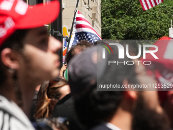 Trump supporters are standing outside as former president Donald Trump is making a statement after a guilty verdict at Trump Tower in New Yo...