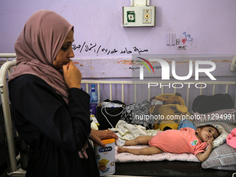 A Palestinian child is suffering from malnutrition and is receiving treatment at Al-Aqsa Martyrs Hospital in Deir al-Balah in the central Ga...